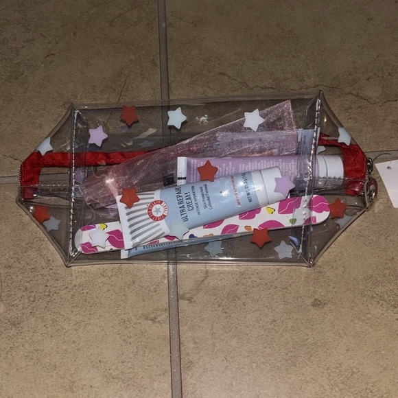 First Aid Beauty Skincare Collection with Teal Scrunchie nail file and cream bun - Picture 6 of 8